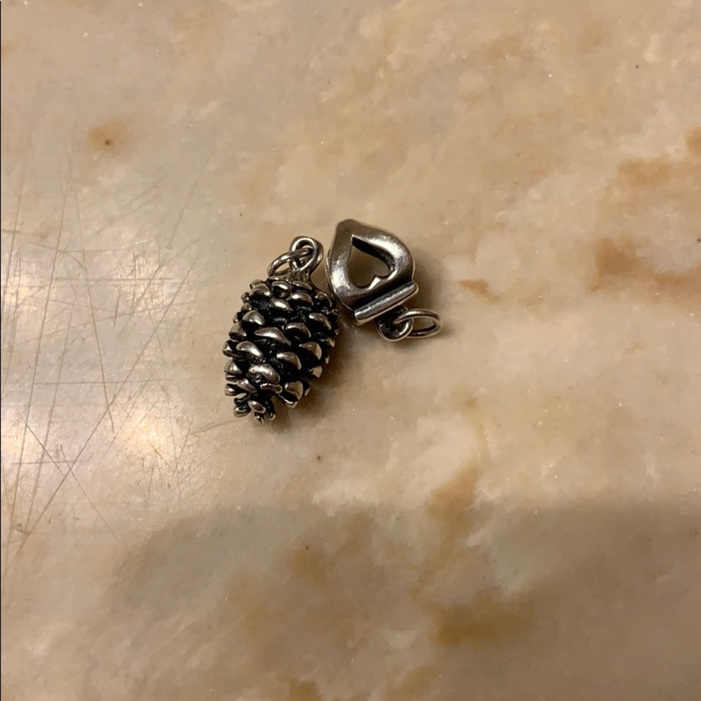 Two silver charms, not James avery